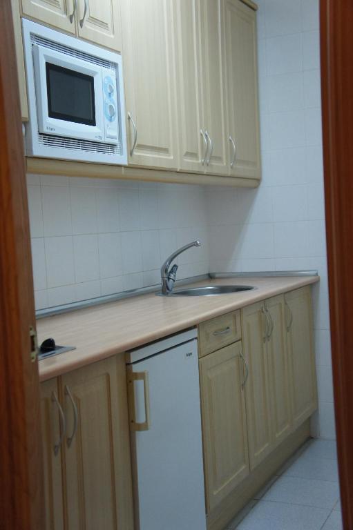 Apartamentos Fidalgo Sandiniés الغرفة الصورة